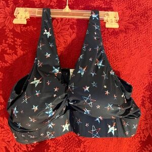 NWT Torrid Curves Red White and Blue Stars Twist Front Sports Bra in a size 2.
